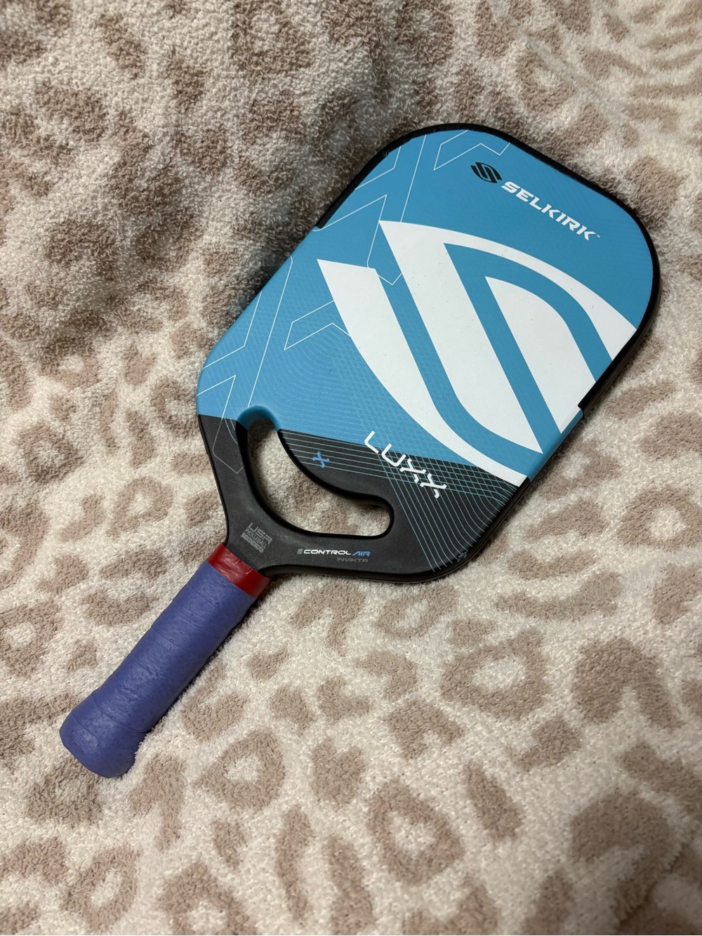 Selkirk LUX-X Blue Pickleball Paddle with Purple Grip